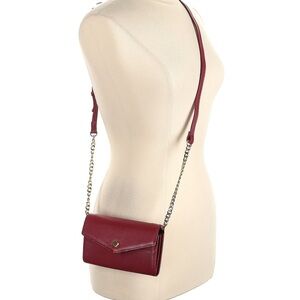 Genuine cranberry leather crossbody wallet with gold chain detail